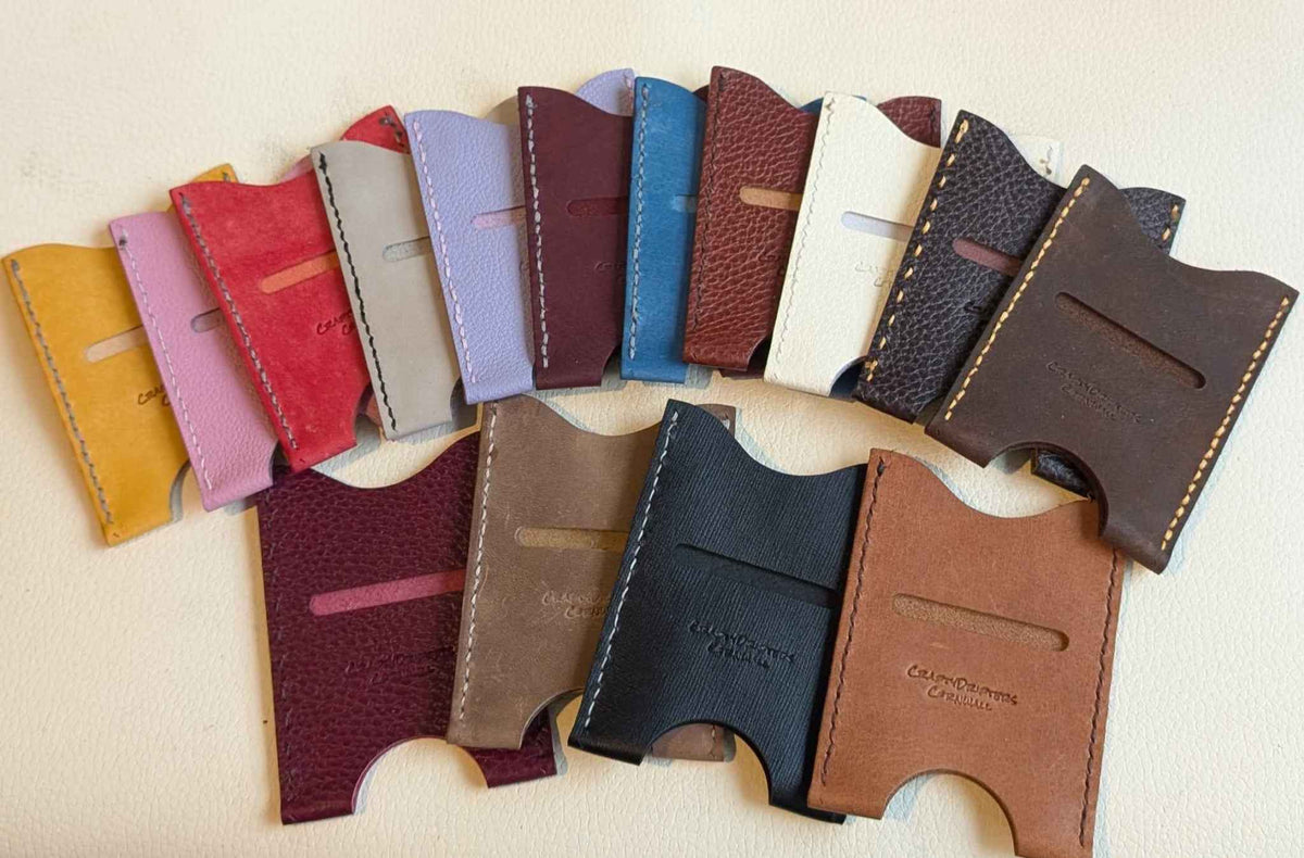Basic leather card sleeves made from salvaged scraps, showcasing eco-friendly, durable, and unique handmade craftsmanship.