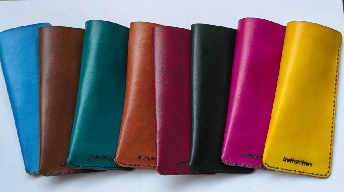 Leather eye wear cases and glasses sleeves on a white background