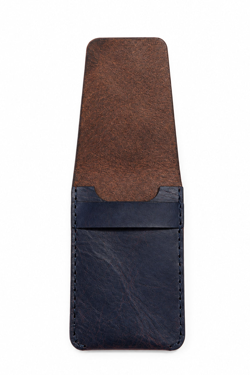 Navy and brown Badalassi Carlo leather card sleeve with the flap opened out