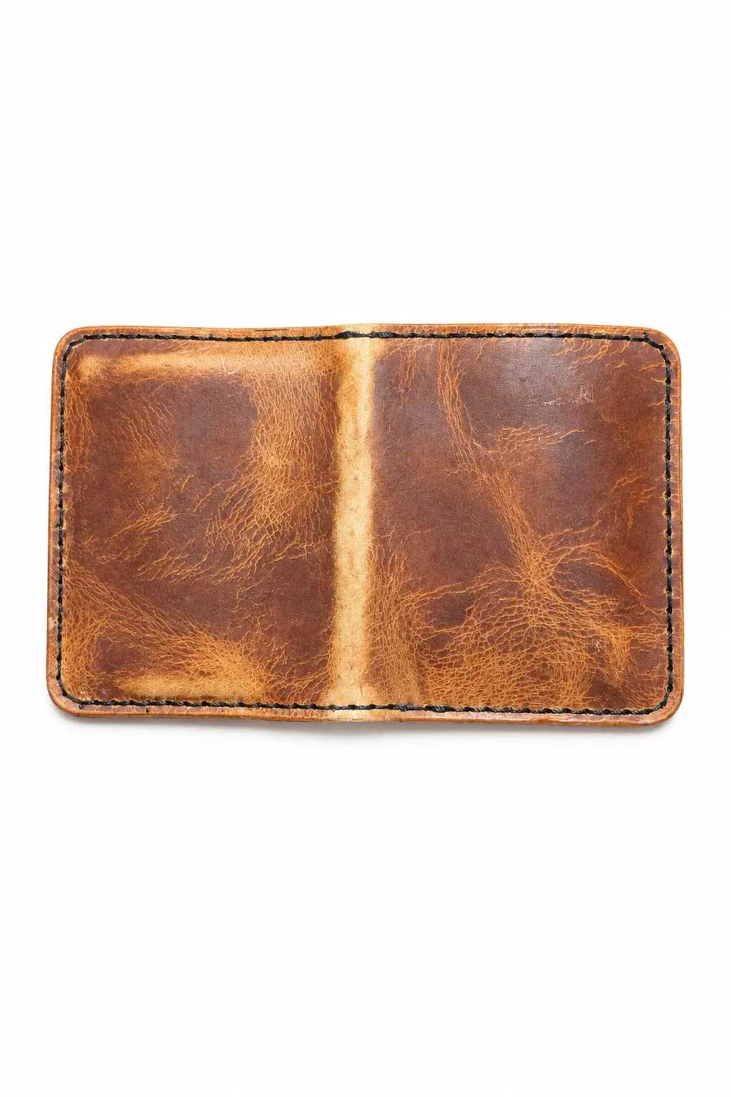 Inside of the empty Style Bi-Fold wallet, showing the waxed leather