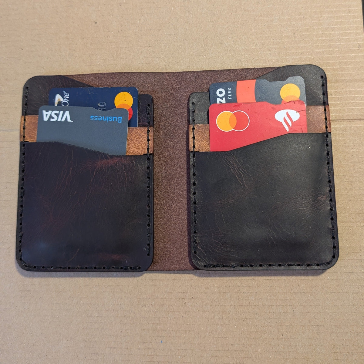 Hilldown Premium Badalassi leather bi-fold open with bank cards in both pockets