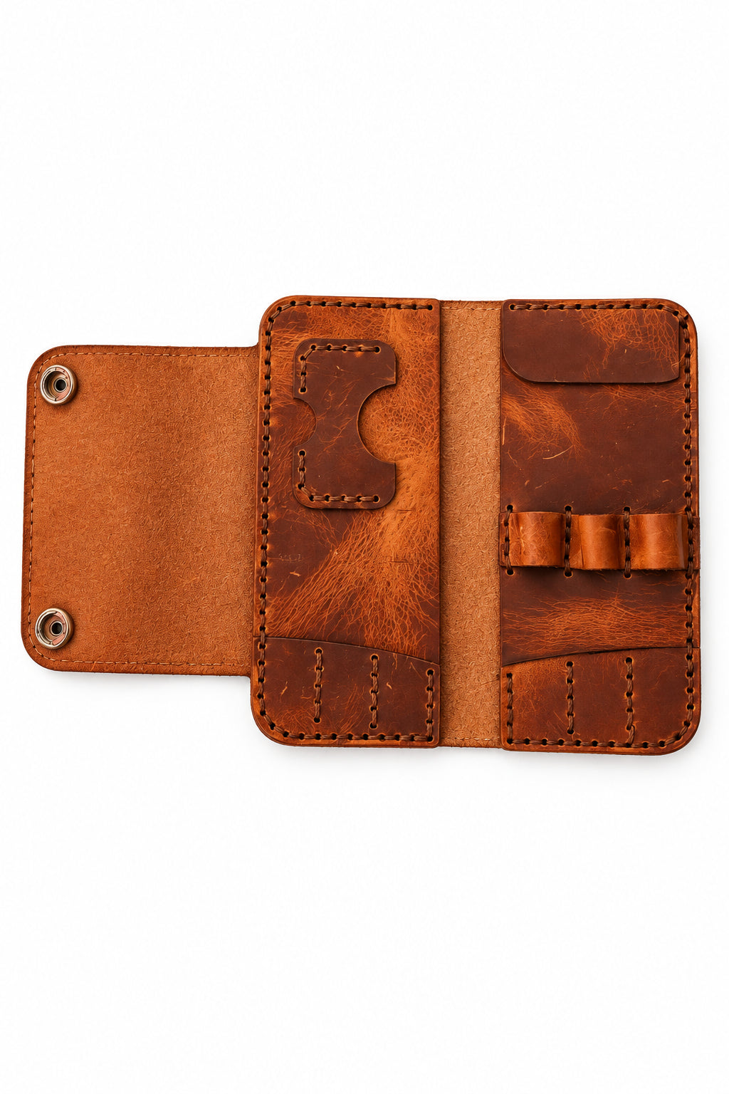 Tan leather darts case laid fully open, showing the inside pockets and dart loops